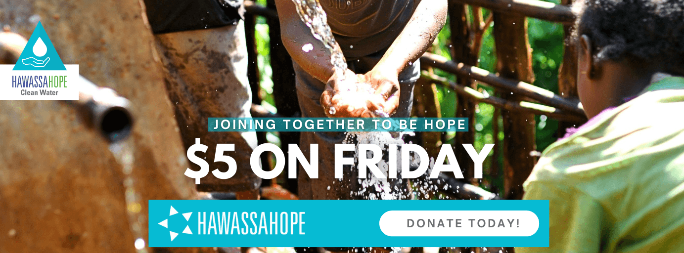 picture of a girl washing her hands under flowing clean water in Ethiopia. give clean water in ethiopia with Hawassa Hope 